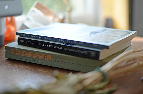 Stack of three books on desk