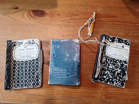 Three modified pocket notebooks